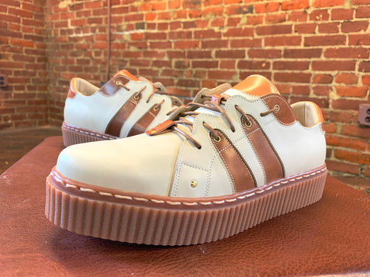 handmade vintage looking sneakers in brown